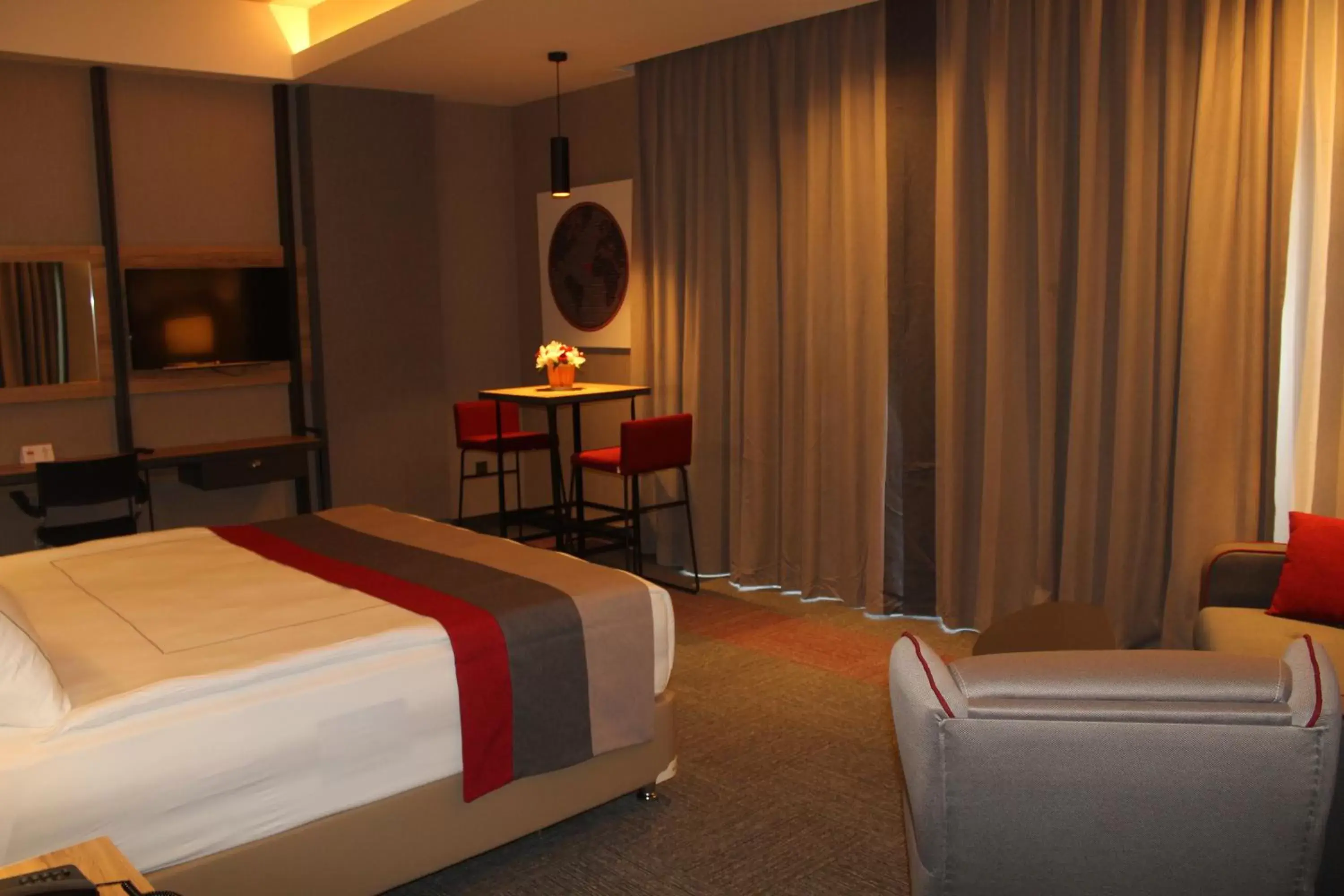 Seating area in Ramada By Wyndham Tire
